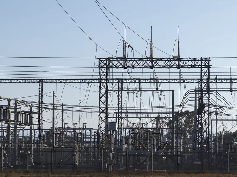 High voltage electrical substation at dawn