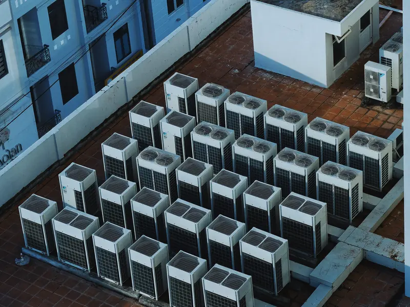Rooftop chiller units on a commercial building